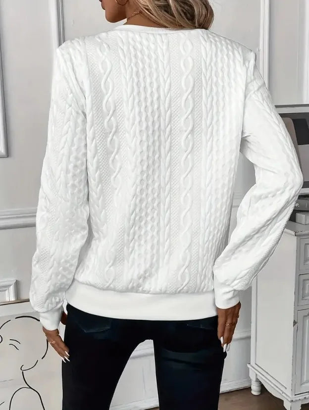 Sudadera con cremallera y textura: elegante y cómoda