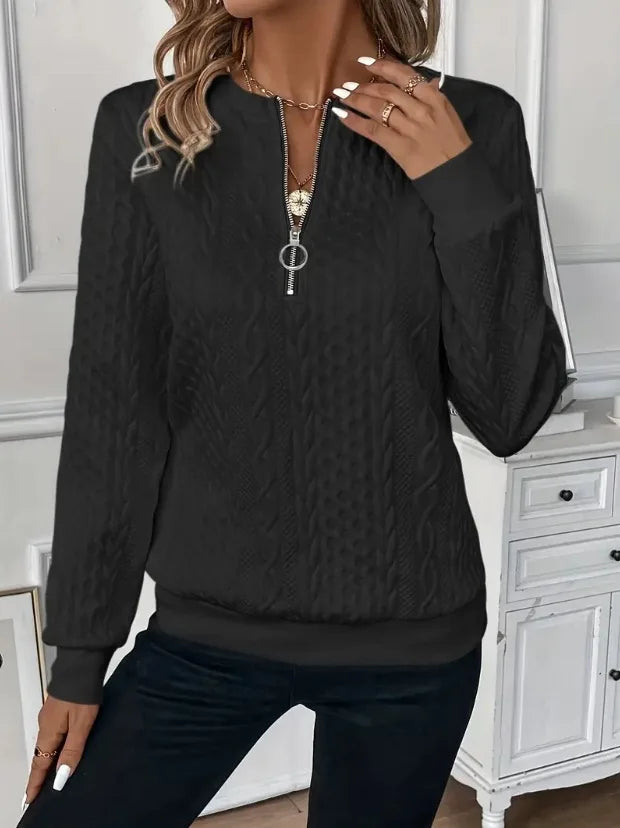 Sudadera con cremallera y textura: elegante y cómoda