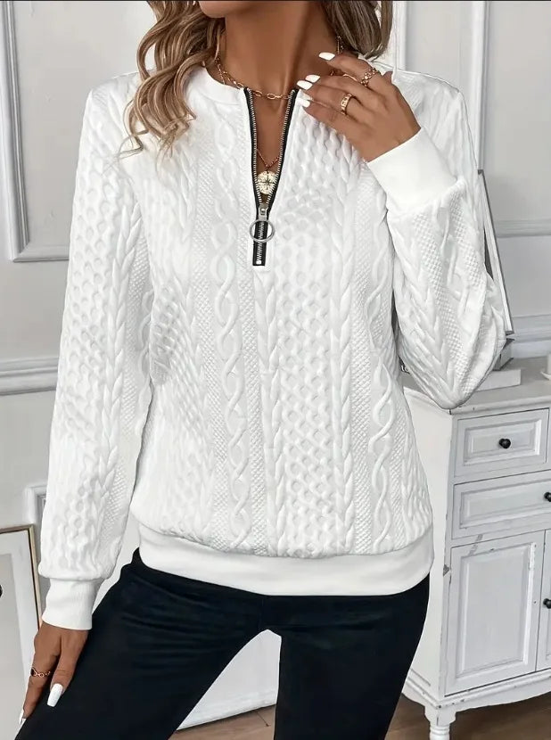 Sudadera con cremallera y textura: elegante y cómoda
