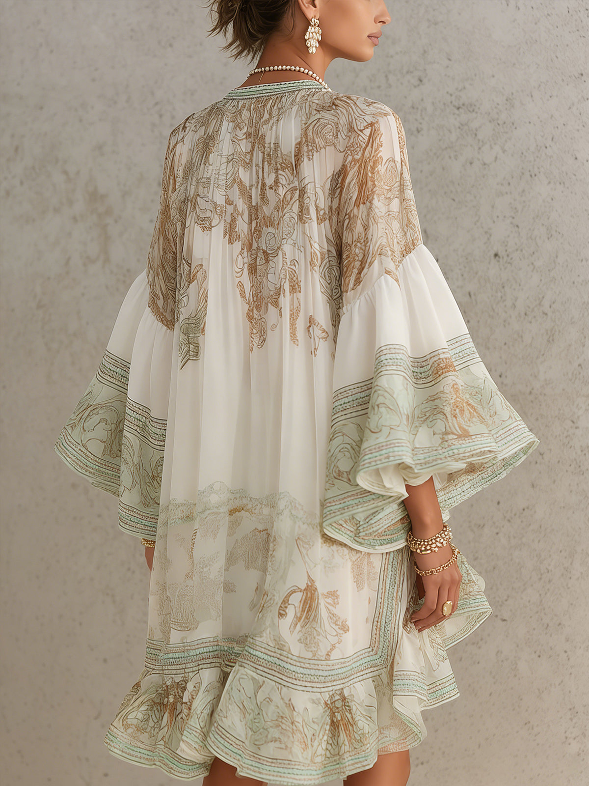 Minivestido de muselina verde estampada con mangas con volantes y bajo con volantes