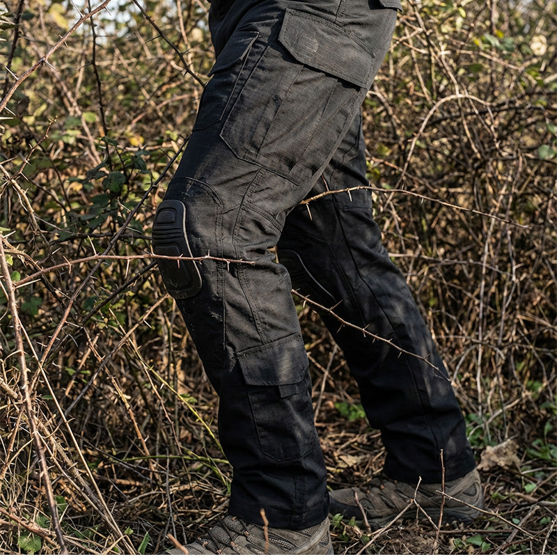 👖👖Pantalones cargo tácticos para hombre con rodilleras integradas: diseñados para ofrecer movilidad, durabilidad y almacenamiento apto para misiones.