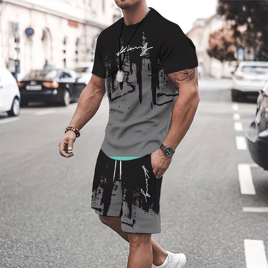 👕 ¡AHORA CON UN 50 % DE DESCUENTO! 🔥 Conjunto de hombre compuesto por una camiseta con estampado gráfico y unos pantalones cortos: tejido suave, diseño llamativo y perfecto para los días de verano ☀️